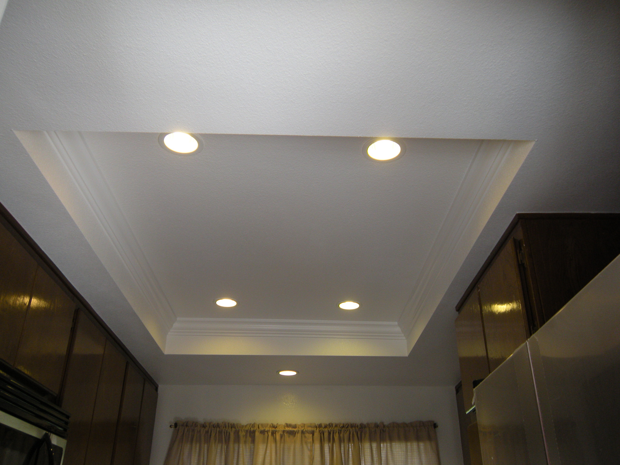 ceiling spotlights over sink for bathroom lighting
