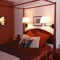 Wall Mounted Bedside Lamps In A Master Bedroom Lighting