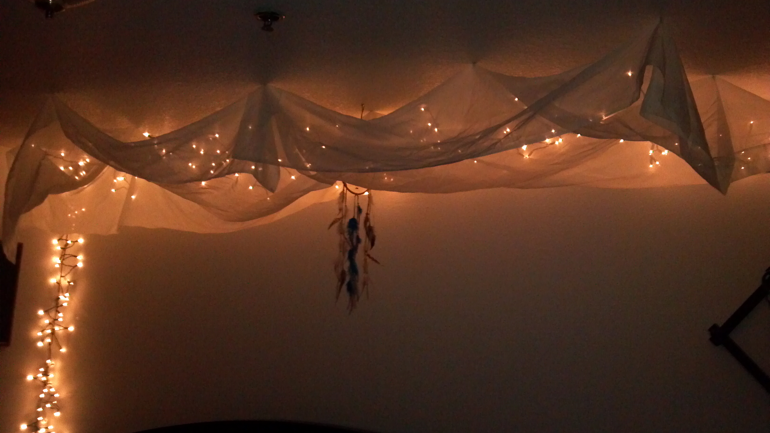 Installing ceiling fairy lights will give you both functional and aesthetic... 