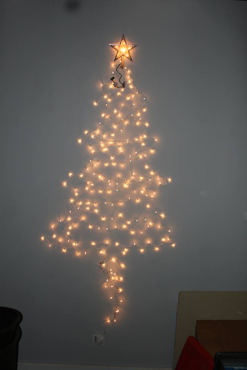 Christmas tree of lights on wall - Warisan Lighting