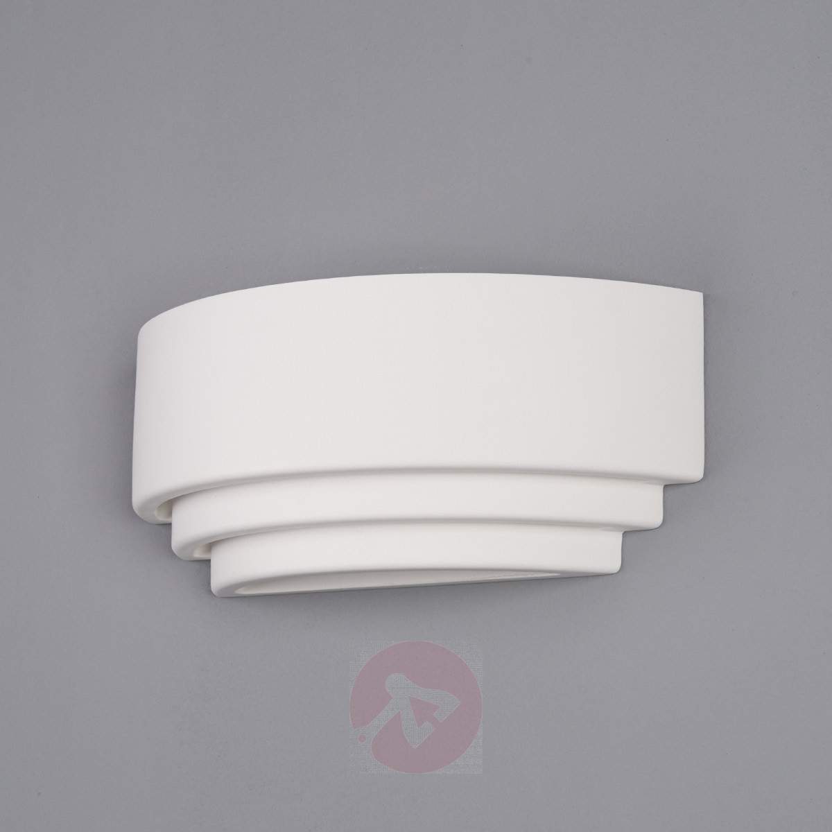 plaster patch behind light fixture