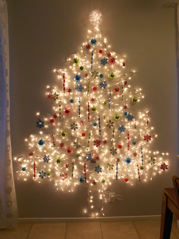 christmas tree of lights on wall photo - 8