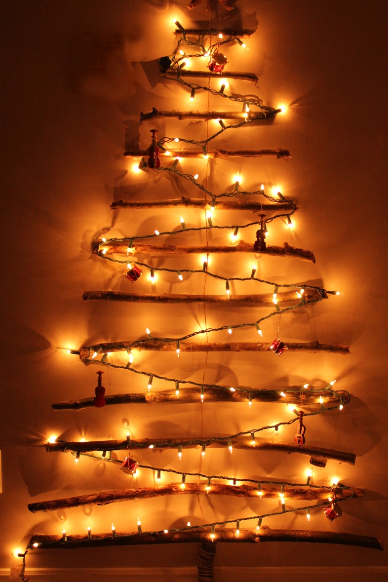 light tree on wall photo - 1